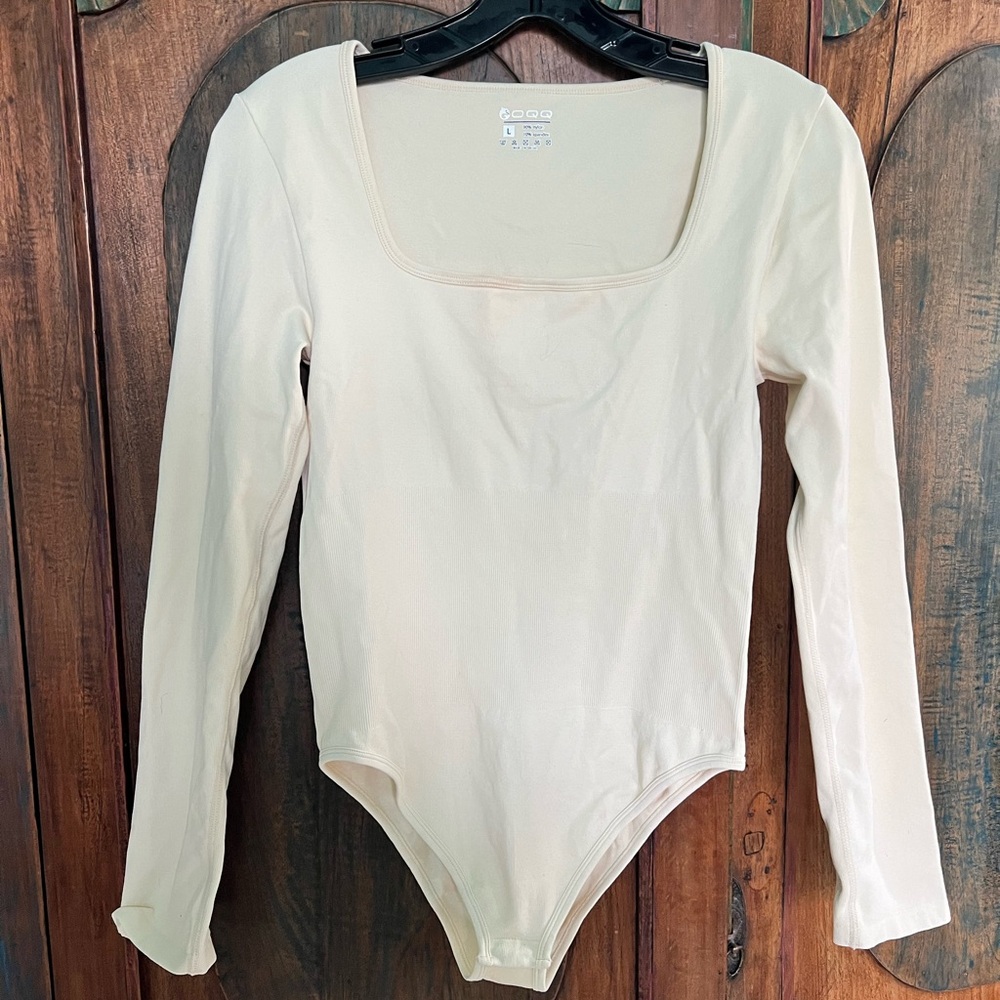 Elegant Cream Long Sleeve Bodysuit